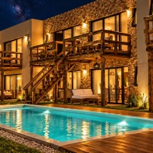 Villa rústica iluminada bajo las estrellas